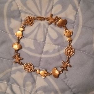 18k gold beach themed bracelet